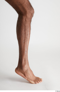 Tiago  1 calf flexing nude side view 0003.jpg